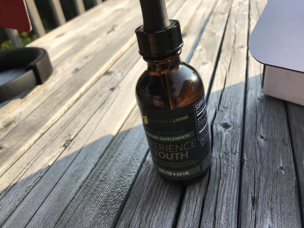Xperience Youth Liquid on an outdoor table